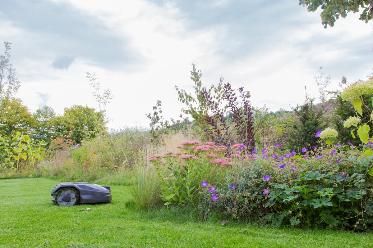 Professionally designed and installed landscape beds with seasonal color in Massachusetts